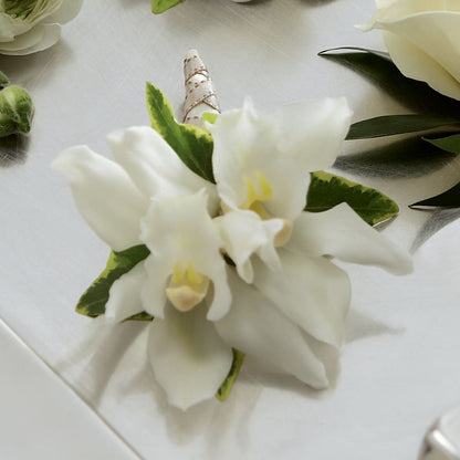 White Mini Cymbidium Boutonniere –  The Happy Florist, Sanford FL